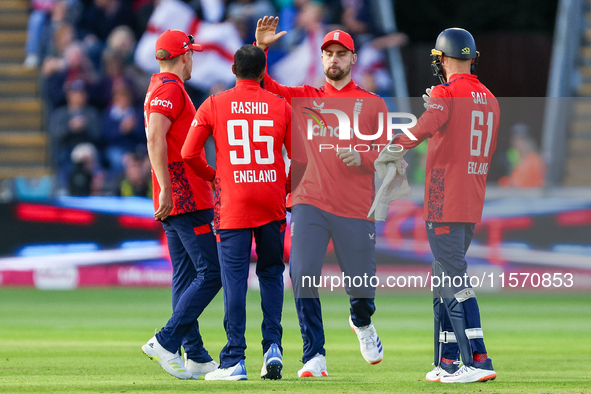 Adil Rashid of England is congratulated for his dismissal of Matthew Short of Australia during the Second Vitality T20 International match b...