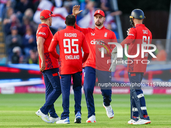 Adil Rashid of England is congratulated for his dismissal of Matthew Short of Australia during the Second Vitality T20 International match b...