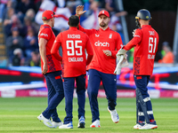 Adil Rashid of England is congratulated for his dismissal of Matthew Short of Australia during the Second Vitality T20 International match b...