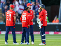 Adil Rashid of England is congratulated for his dismissal of Matthew Short of Australia during the Second Vitality T20 International match b...