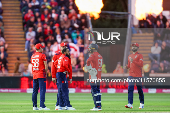 Adil Rashid of England is congratulated for his dismissal of Matthew Short of Australia during the Second Vitality T20 International match b...