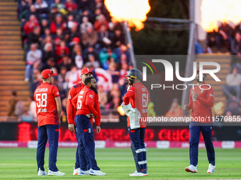 Adil Rashid of England is congratulated for his dismissal of Matthew Short of Australia during the Second Vitality T20 International match b...