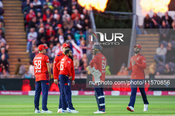 Adil Rashid of England is congratulated for his dismissal of Matthew Short of Australia during the Second Vitality T20 International match b...