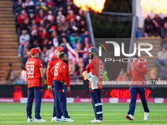 Adil Rashid of England is congratulated for his dismissal of Matthew Short of Australia during the Second Vitality T20 International match b...