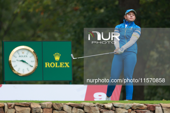 GAINESVILLE, VIRGINIA - SEPTEMBER 13: Emily Kristine Pedersen of Team Europe follows her shot from the 9th tee during Day One of the Solheim...