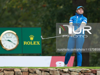 GAINESVILLE, VIRGINIA - SEPTEMBER 13: Emily Kristine Pedersen of Team Europe follows her shot from the 9th tee during Day One of the Solheim...