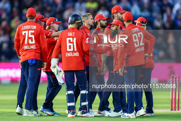 #23, Liam Livingstone of England (center facing right), celebrates taking the wicket of #23, Jake Fraser-McGurk of Australia, caught by #75,...