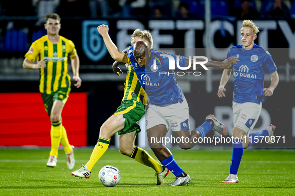 FC Den Bosch player Danzell Gravenberch and ADO Den Haag player Juho Kilo during the match between Den Bosch and ADO at De Vliert for the Ke...