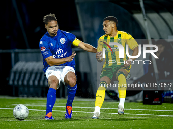 FC Den Bosch player Victor van den Bogaert and ADO Den Haag player Steven van der Sloot during the match between Den Bosch and ADO at De Vli...