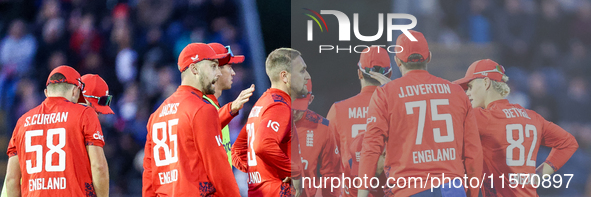 #23, Liam Livingstone of England (center facing right), celebrates taking the wicket of #17, Marcus Stones of Australia, caught by #75, Jami...