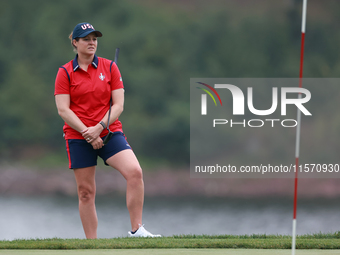 GAINESVILLE, VIRGINIA - SEPTEMBER 13: Ally Ewing of the United States looks over the 9th green during Day One of the Solheim Cup at Robert T...