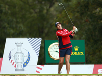 GAINESVILLE, VIRGINIA - SEPTEMBER 13: Ally Ewing of the United States hits from the 9th tee during Day One of the Solheim Cup at Robert Tren...