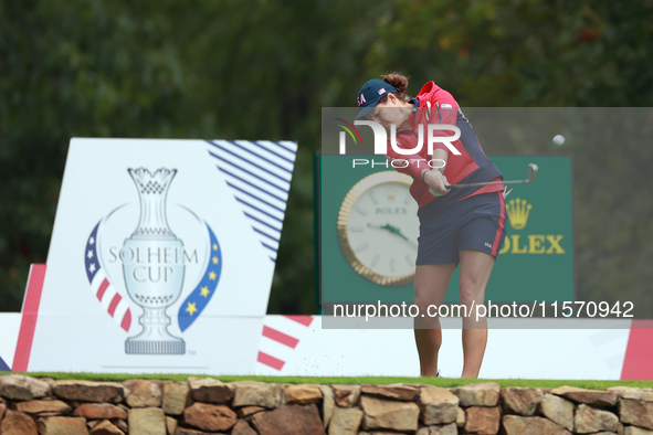 GAINESVILLE, VIRGINIA - SEPTEMBER 13: Ally Ewing of the United States hits from the 9th tee during Day One of the Solheim Cup at Robert Tren...