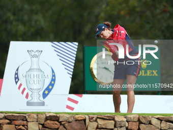 GAINESVILLE, VIRGINIA - SEPTEMBER 13: Ally Ewing of the United States hits from the 9th tee during Day One of the Solheim Cup at Robert Tren...