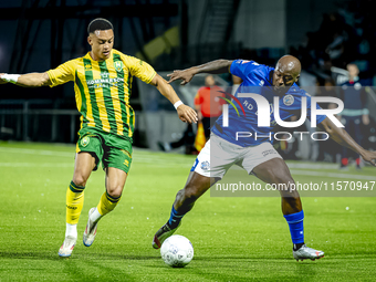 ADO Den Haag player Steven van der Sloot and FC Den Bosch player Danzell Gravenberch during the match Den Bosch vs. ADO at De Vliert for the...