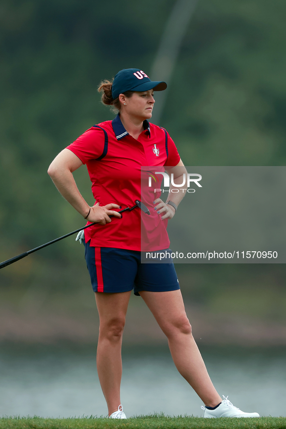 GAINESVILLE, VIRGINIA - SEPTEMBER 13: Ally Ewing of the United States waits on the 9th green during Day One of the Solheim Cup at Robert Tre...