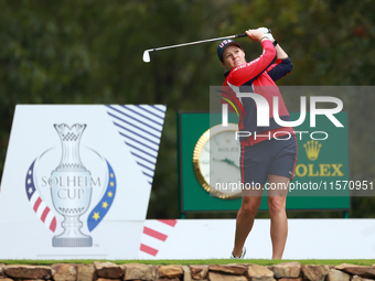 GAINESVILLE, VIRGINIA - SEPTEMBER 13: Ally Ewing of the United States hits from the 9th tee during Day One of the Solheim Cup at Robert Tren...