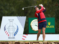 GAINESVILLE, VIRGINIA - SEPTEMBER 13: Ally Ewing of the United States hits from the 9th tee during Day One of the Solheim Cup at Robert Tren...