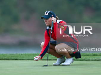 GAINESVILLE, VIRGINIA - SEPTEMBER 13: Jennifer Kupcho of the United States lines up her putt on the 9th green during Day One of the Solheim...