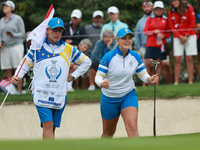 GAINESVILLE, VIRGINIA - SEPTEMBER 13: Emily Kristine Pedersen of Team Europe celebrates as her teammate Maja Stark makes her putt on the 7th...