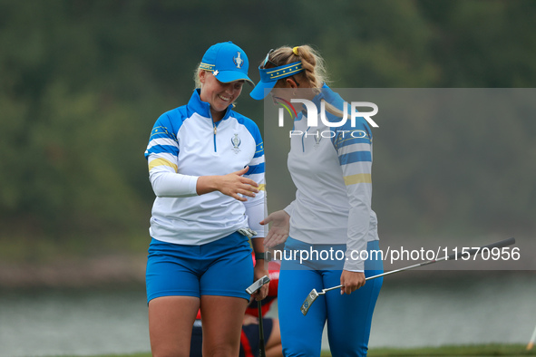 GAINESVILLE, VIRGINIA - SEPTEMBER 13: Maja Stark of Team Europe (L) celebrates with teammate Emily Kristine Pedersen (R) on the 9th green du...