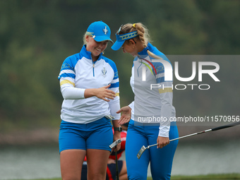 GAINESVILLE, VIRGINIA - SEPTEMBER 13: Maja Stark of Team Europe (L) celebrates with teammate Emily Kristine Pedersen (R) on the 9th green du...