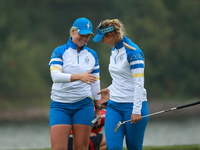 GAINESVILLE, VIRGINIA - SEPTEMBER 13: Maja Stark of Team Europe (L) celebrates with teammate Emily Kristine Pedersen (R) on the 9th green du...