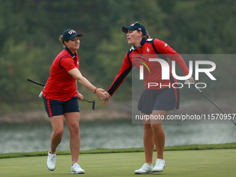 GAINESVILLE, VIRGINIA - SEPTEMBER 13: Jennifer Kupcho of the United States (R) celebrates with teammate Ally Ewing (L) on the 9th green duri...