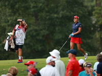 GAINESVILLE, VIRGINIA - SEPTEMBER 13: Lexi Thompson of the United States walks on the first hole during Fourball Matches on Day One of the S...