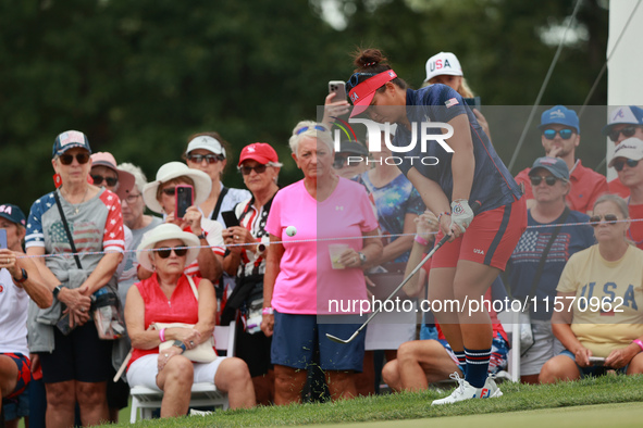 GAINESVILLE, VIRGINIA - SEPTEMBER 13: Megan Khang of the United States chips into the third green during Fourball Matches on Day One of the...