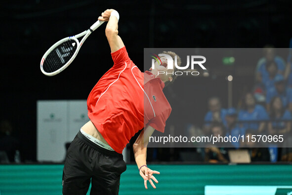 Alexander Blockx (BEL) is in action during the 2024 Davis Cup Finals Group Stage Bologna match between Italy and Belgium at Unipol Arena in...