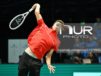 Alexander Blockx (BEL) is in action during the 2024 Davis Cup Finals Group Stage Bologna match between Italy and Belgium at Unipol Arena in...