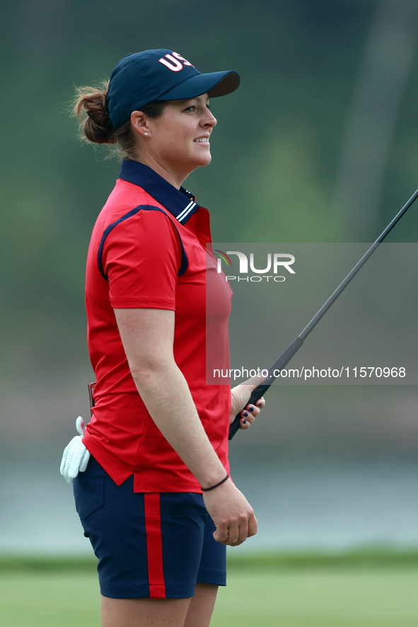 GAINESVILLE, VIRGINIA - SEPTEMBER 13: Ally Ewing of the United States waits on the 9th green during Day One of the Solheim Cup at Robert Tre...