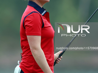 GAINESVILLE, VIRGINIA - SEPTEMBER 13: Ally Ewing of the United States waits on the 9th green during Day One of the Solheim Cup at Robert Tre...