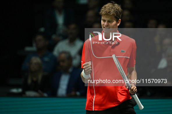 Alexander Blockx (BEL) is in action during the 2024 Davis Cup Finals Group Stage Bologna match between Italy and Belgium at Unipol Arena in...