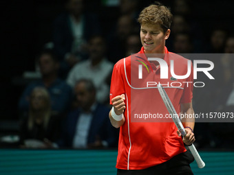 Alexander Blockx (BEL) is in action during the 2024 Davis Cup Finals Group Stage Bologna match between Italy and Belgium at Unipol Arena in...