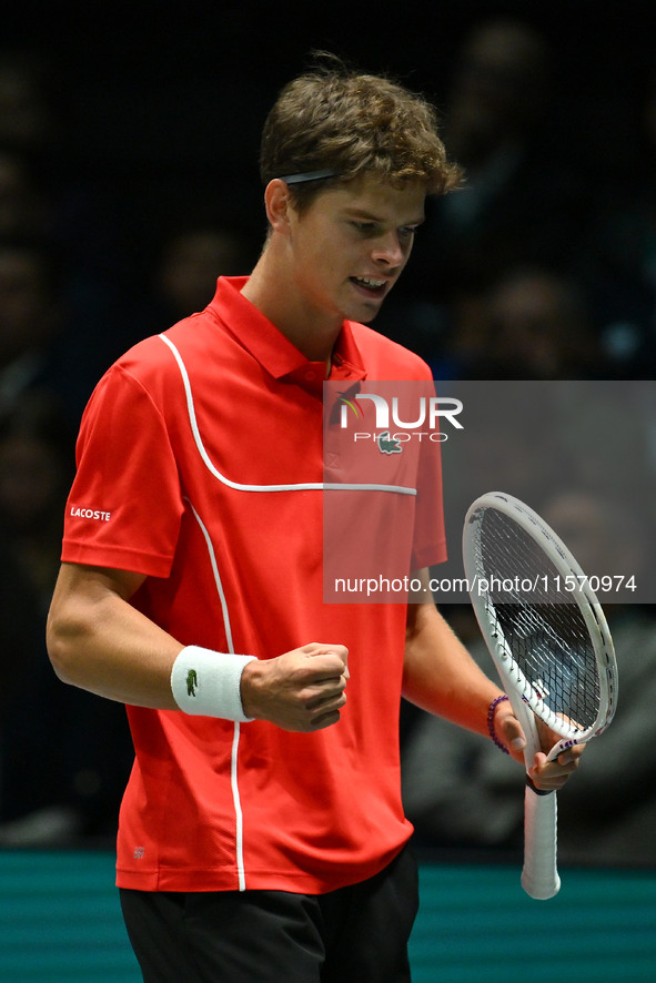 Alexander Blockx (BEL) is in action during the 2024 Davis Cup Finals Group Stage Bologna match between Italy and Belgium at Unipol Arena in...