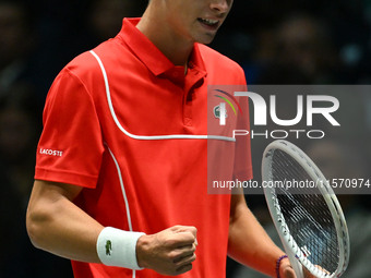 Alexander Blockx (BEL) is in action during the 2024 Davis Cup Finals Group Stage Bologna match between Italy and Belgium at Unipol Arena in...