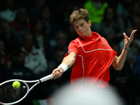 Alexander Blockx (BEL) is in action during the 2024 Davis Cup Finals Group Stage Bologna match between Italy and Belgium at Unipol Arena in...