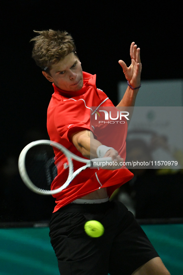 Alexander Blockx (BEL) is in action during the 2024 Davis Cup Finals Group Stage Bologna match between Italy and Belgium at Unipol Arena in...