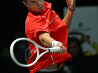 Alexander Blockx (BEL) is in action during the 2024 Davis Cup Finals Group Stage Bologna match between Italy and Belgium at Unipol Arena in...