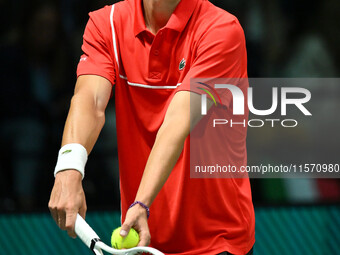 Alexander Blockx (BEL) is in action during the 2024 Davis Cup Finals Group Stage Bologna match between Italy and Belgium at Unipol Arena in...