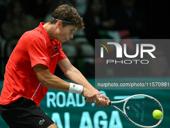 Alexander Blockx (BEL) is in action during the 2024 Davis Cup Finals Group Stage Bologna match between Italy and Belgium at Unipol Arena in...