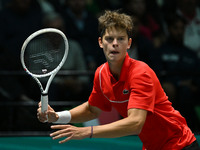 Alexander Blockx (BEL) is in action during the 2024 Davis Cup Finals Group Stage Bologna match between Italy and Belgium at Unipol Arena in...