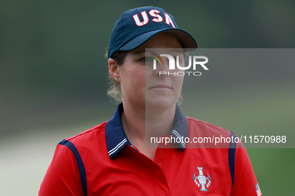 GAINESVILLE, VIRGINIA - SEPTEMBER 13: Ally Ewing of the United States walks from the 9th green during Day One of the Solheim Cup at Robert T...