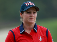 GAINESVILLE, VIRGINIA - SEPTEMBER 13: Ally Ewing of the United States walks from the 9th green during Day One of the Solheim Cup at Robert T...