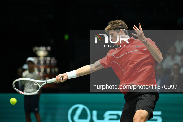 Alexander Blockx (BEL) is in action during the 2024 Davis Cup Finals Group Stage Bologna match between Italy and Belgium at Unipol Arena in...