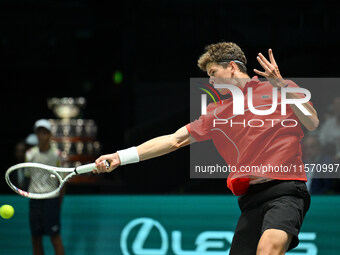 Alexander Blockx (BEL) is in action during the 2024 Davis Cup Finals Group Stage Bologna match between Italy and Belgium at Unipol Arena in...