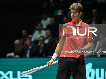 Alexander Blockx (BEL) is in action during the 2024 Davis Cup Finals Group Stage Bologna match between Italy and Belgium at Unipol Arena in...