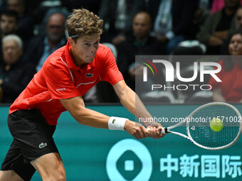 Alexander Blockx (BEL) is in action during the 2024 Davis Cup Finals Group Stage Bologna match between Italy and Belgium at Unipol Arena in...